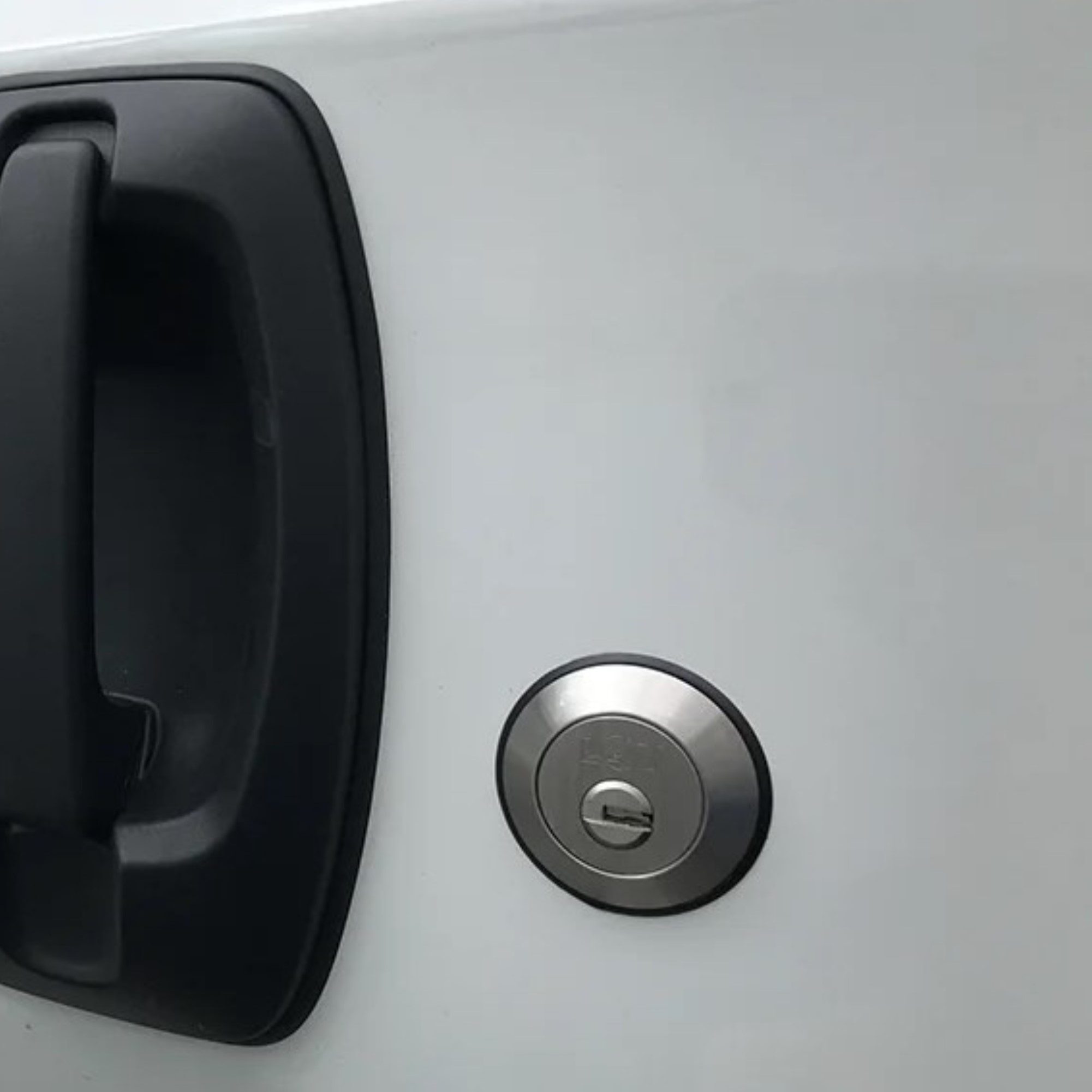 Slam Lock installed on a white van.